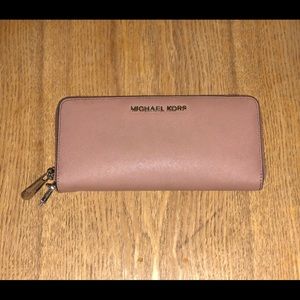 Pink Michael Kors leather long wallet.
